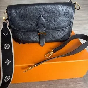 Louis Vuitton Black Bag Timeless Elegance Discover Timeless Elegance: Louis Vuitton Coussin PM at  main image 2